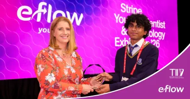 The image shows a woman presenting an award to a school student at Stripe Young Scientist and Technology Exhibition. There are eFlow and TII logos on the bottom right corner.